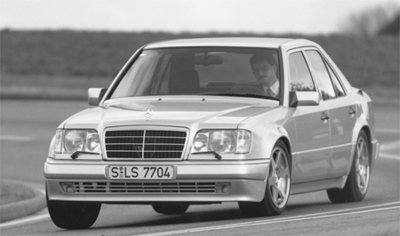 The 500E [E500 above] 32-valve 5.0 liter V-8 made 315 hp, went zero to sixty in less than six seconds and had a top speed of 150 mph (electronically limited).
The sport suspension package was telegraphed by flared fenders, 8 inch wheels, and 225/55-16 ZR tires.
Almost every option was standard equipment including a Sportline interior with four leather bucket seats. The 500E was fitted with a self-leveling rear suspension, ASR traction control, and dual airbags. Priced at $79,200 with an added $2,600 gas guzzler tax, the 500E was the ultra-high-performance 4-door sedan.
Chapter 1: Introduction to the E-Class
page 21