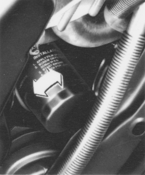 Engine oil filter located in front of engine, behind radiator. (Shown viewed from below).
Lubrication and Maintenance
page 13